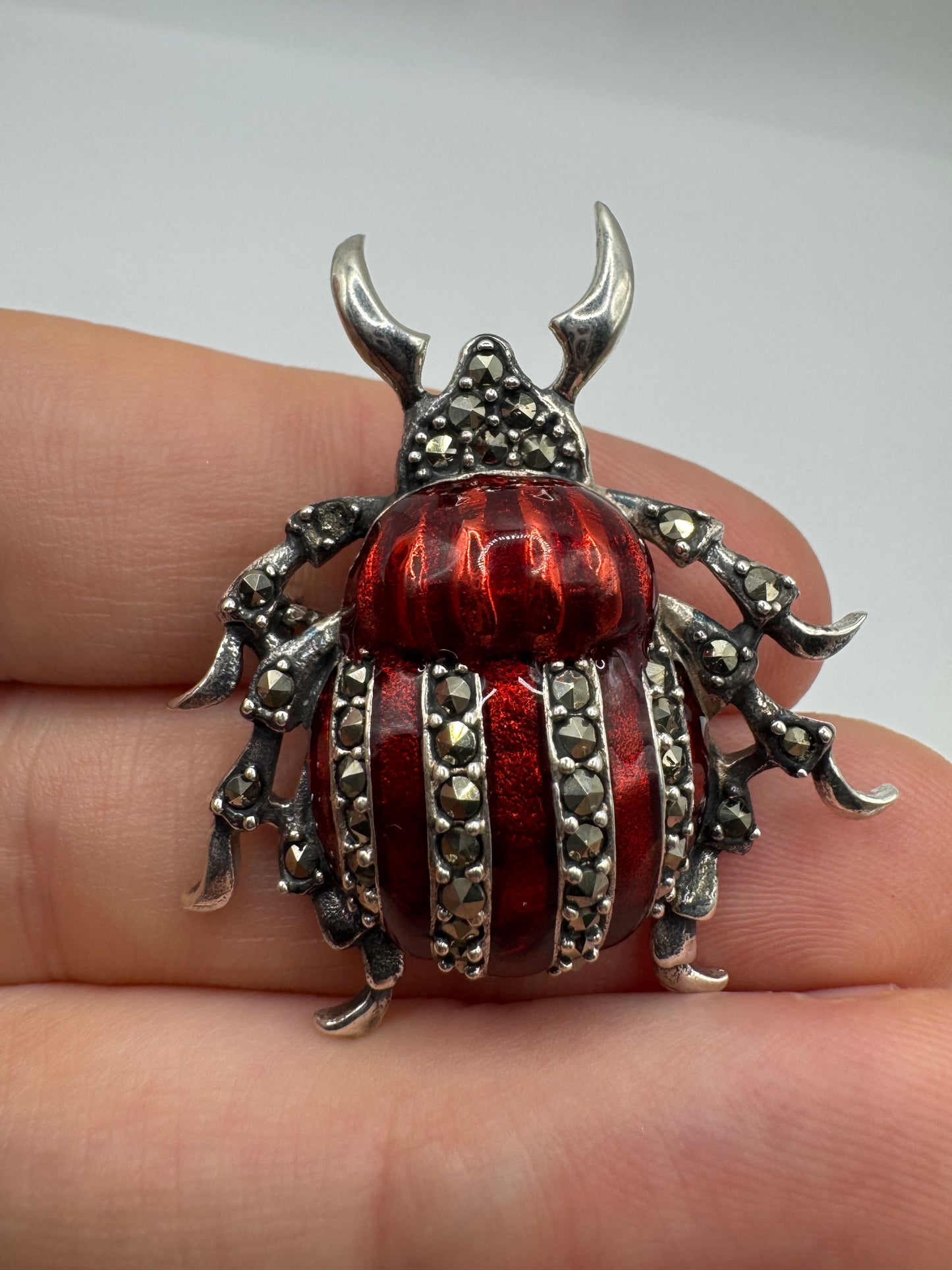 Silver enamel and marcasite insect brooch
