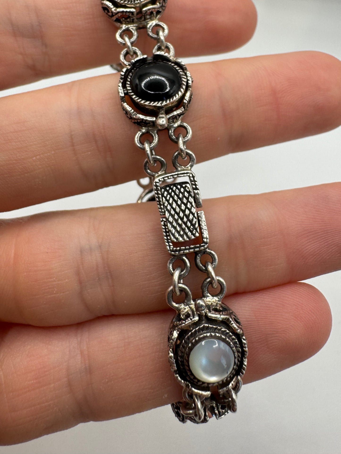 Silver moonstone and onyx reversible bracelet