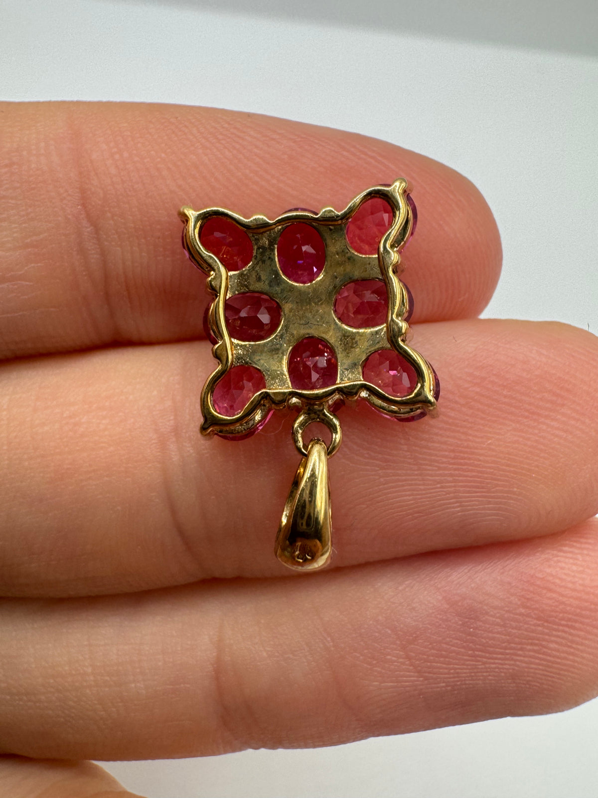 9ct gold pink topaz and diamond pendant