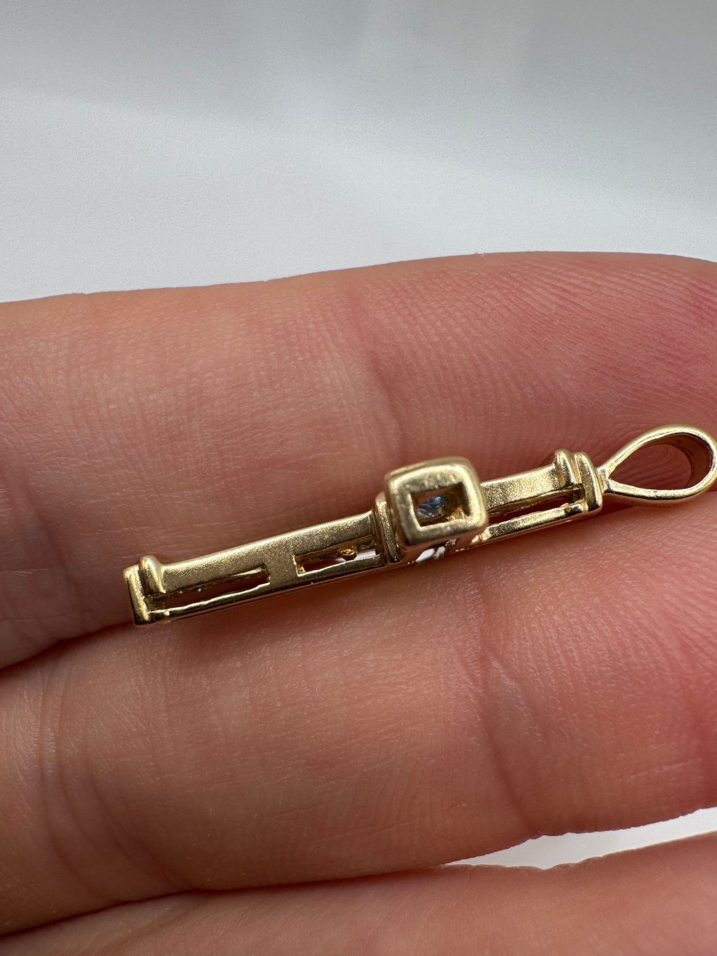 9ct gold topaz and diamond cross pendant