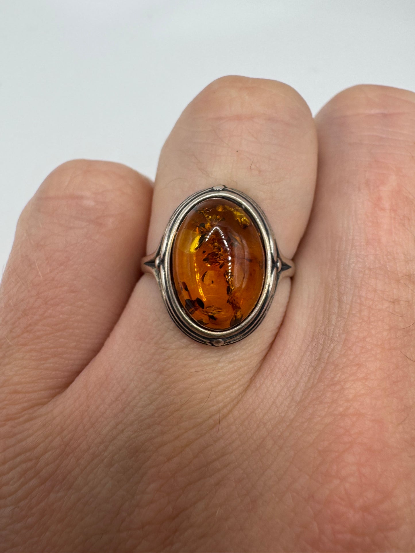 Silver amber ring
