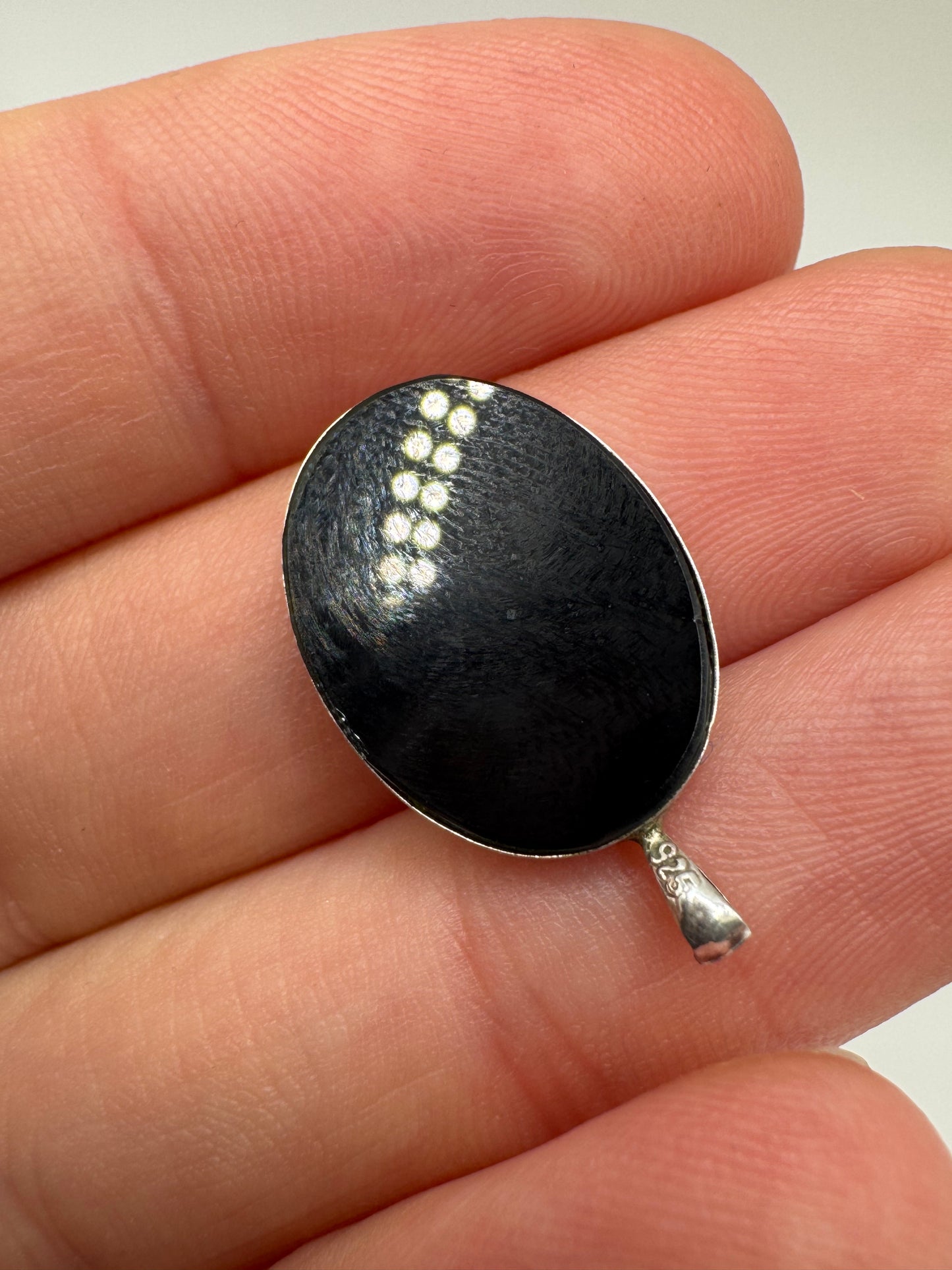 Silver onyx and black opal inlay unicorn pendant