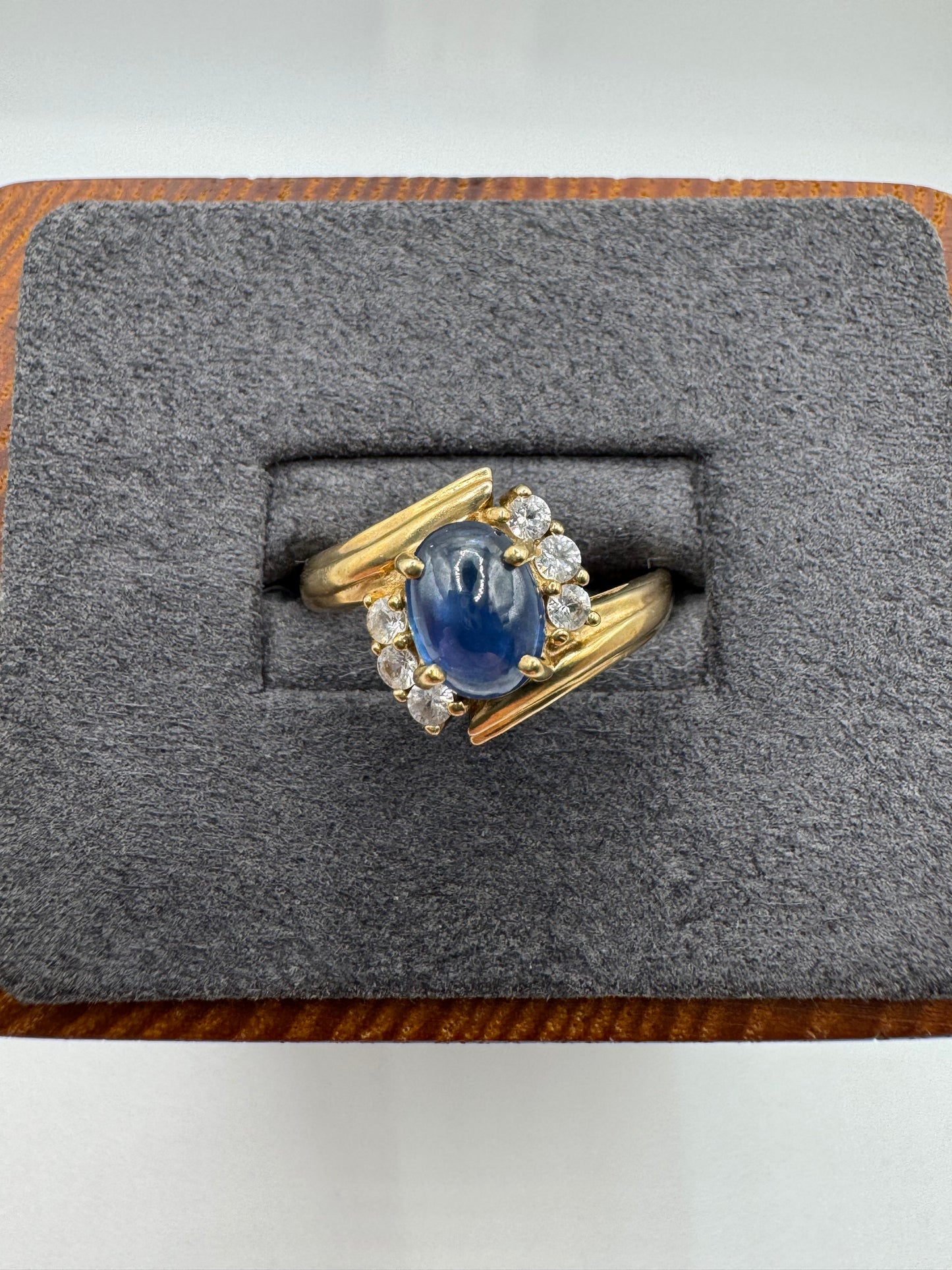 9ct gold cabochon sapphire and zircon ring
