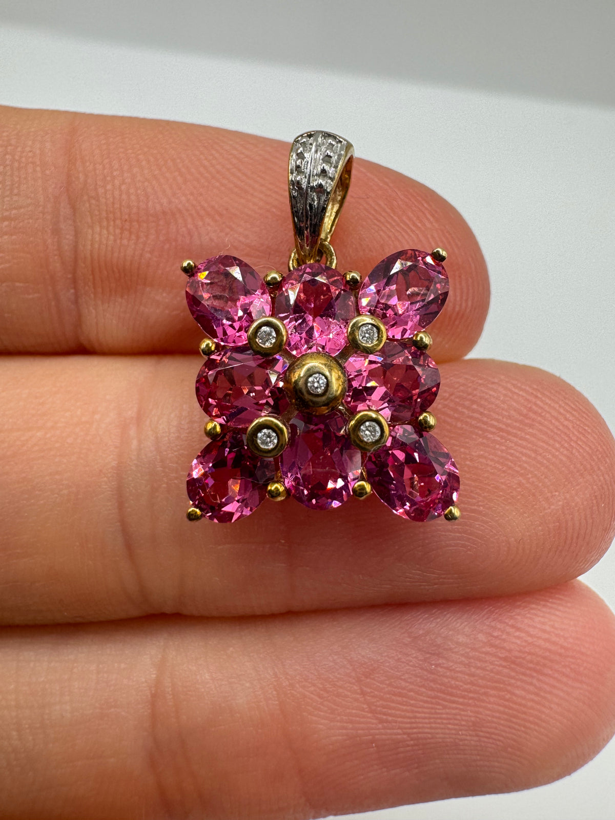 9ct gold pink topaz and diamond pendant