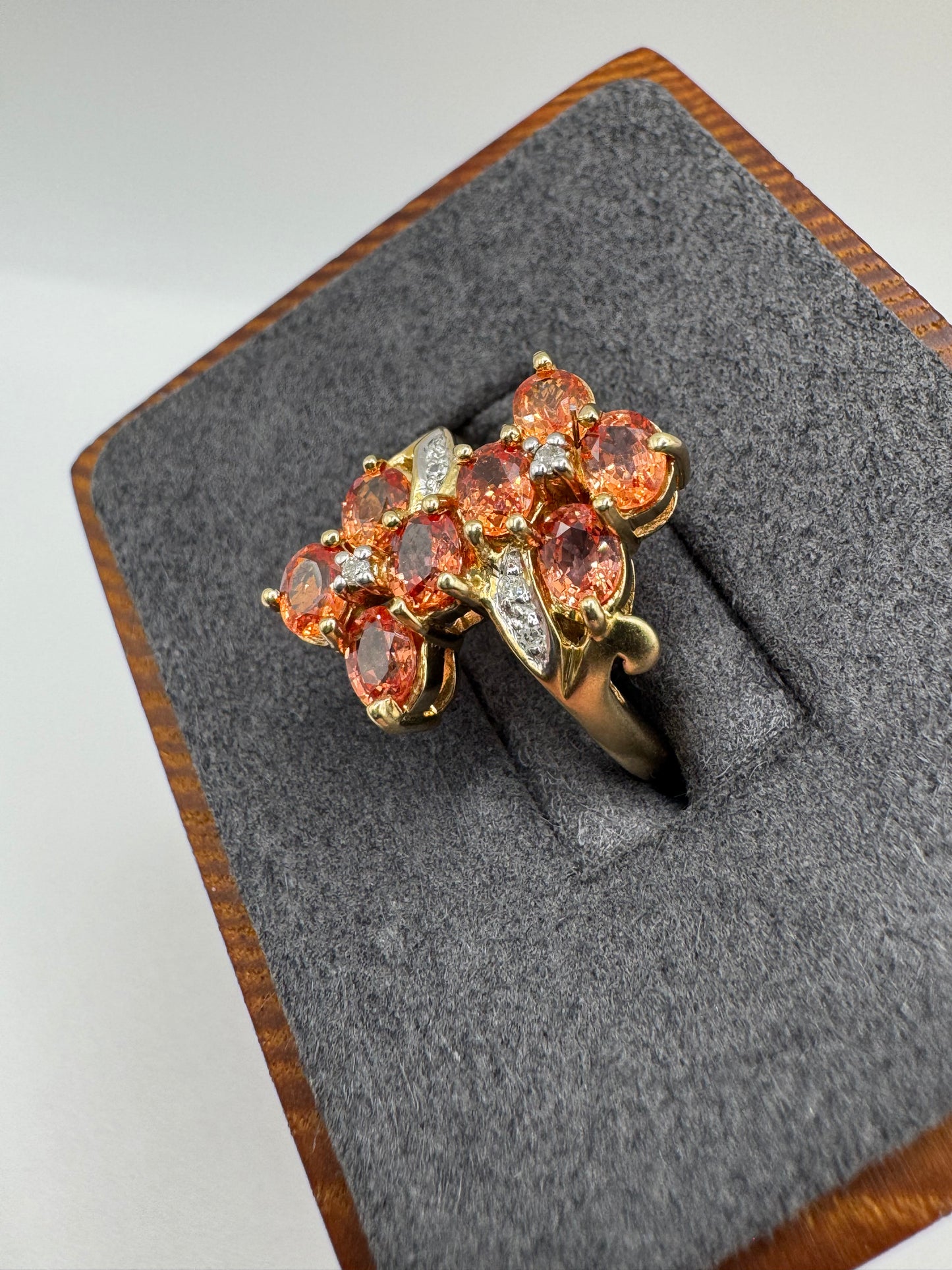 Heavy 9ct gold orange sapphire and diamond ring