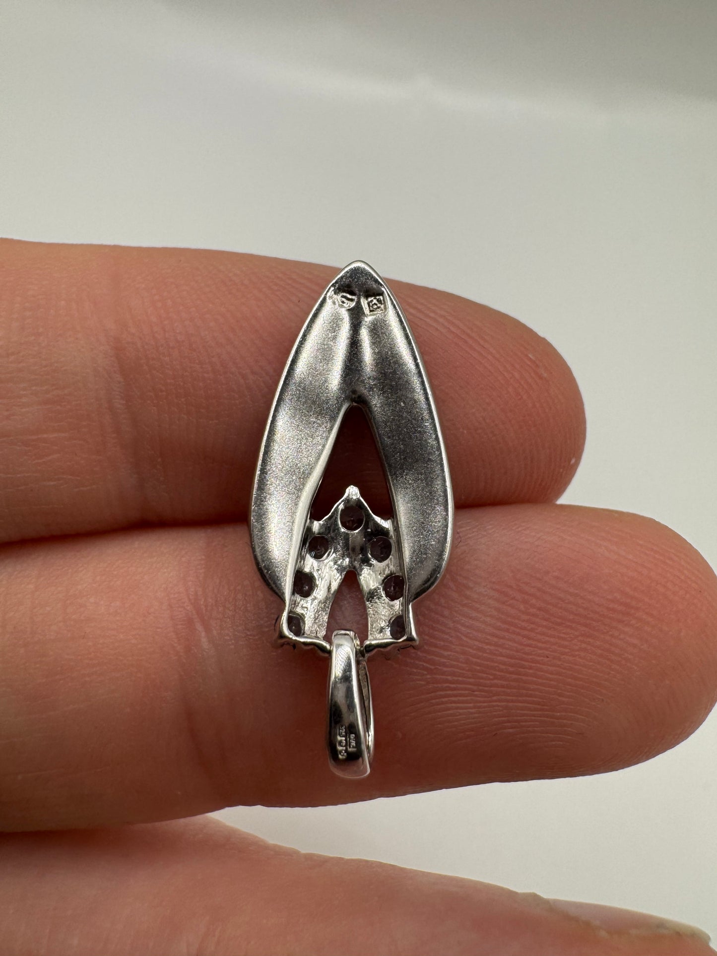 9ct white gold black opal and topaz pendant