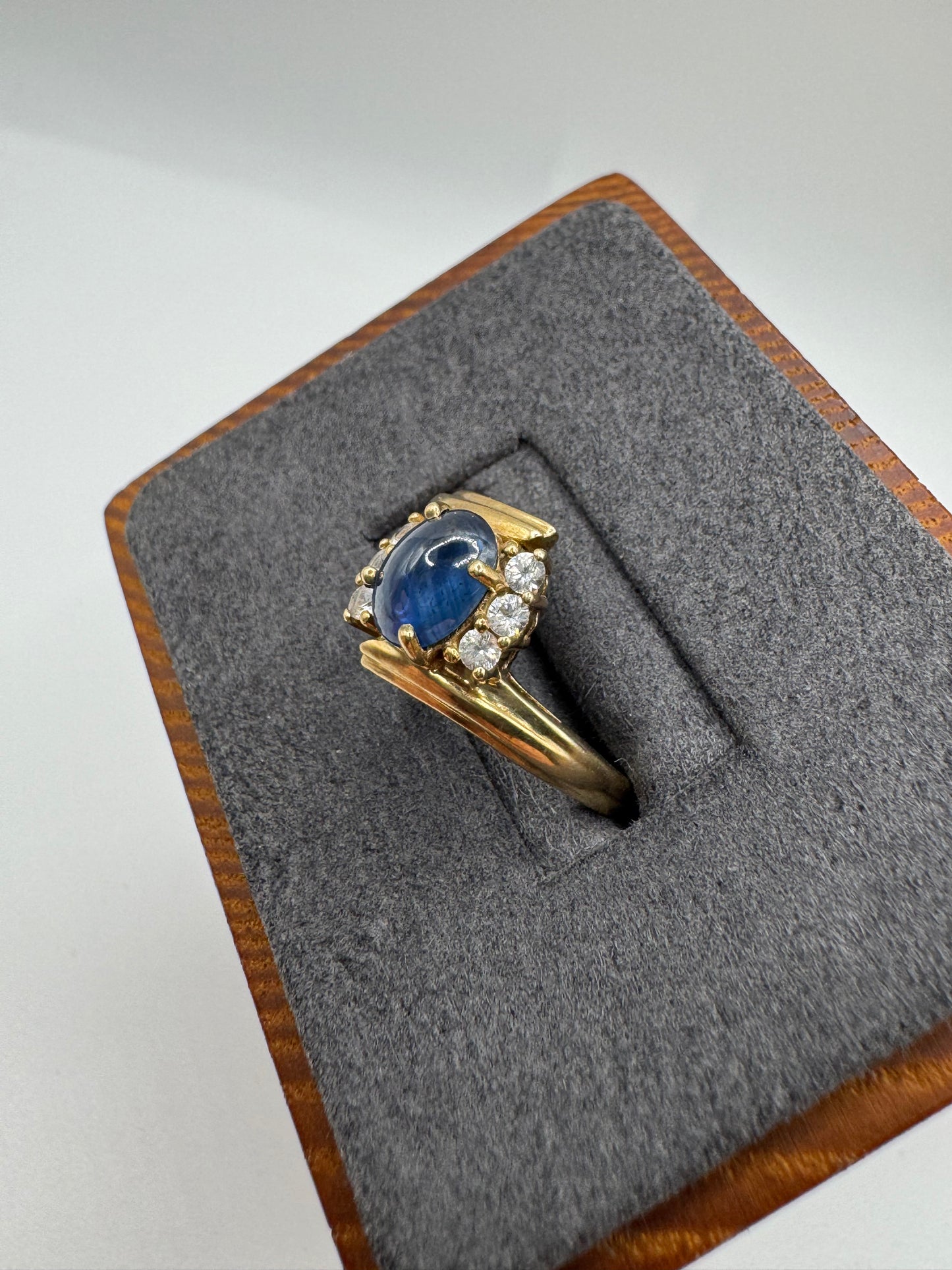 9ct gold cabochon sapphire and zircon ring