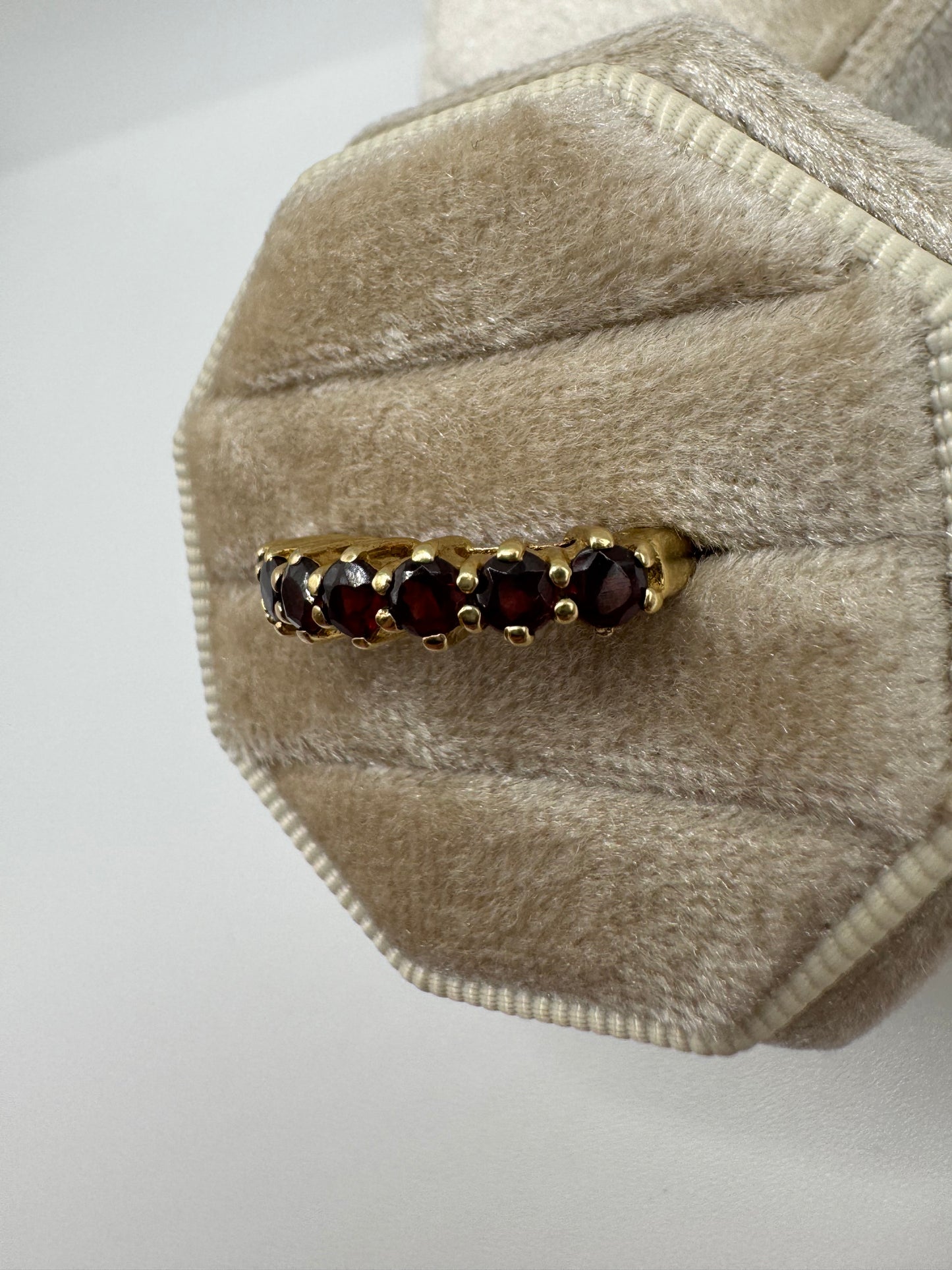 9ct gold garnet half eternity ring